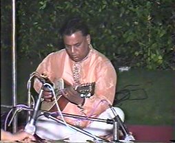 Dharmendra Bhatt performing in concert