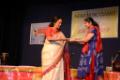 Shubha Joshi felicitating a student.