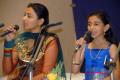 Ashwini and Tanvi Narayangaonkar singing in a show