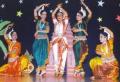 Anita Babu performing in concert with her group