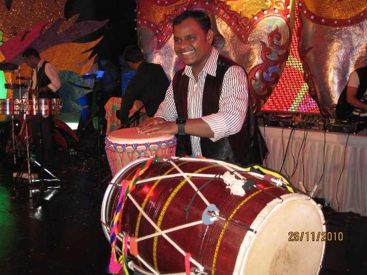 Satyajit Jamsandekar performing Djembe in program