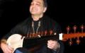Asad Qizilbash performing in concert