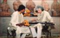 Debashish showing his invention to Maestro of Santoor Pt. Shiv Kumar Sharma at Kolkata