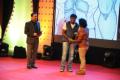 Chetan receiving award