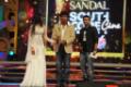 A famous Kanada playback singer Chetan receiving Sandal south scope award