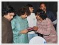 Santosh Gante with Ustad Zakir Hussin.