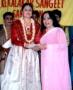 Receiving Singarmani title from Sitara Deviji.