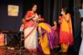 Students of Meera Music classes taking blessings from Shubha Joshi.