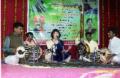 Udhav Shinde and Judy Rust performing in program in December 2009.