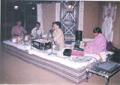 Vijay Pathak performing on stage.