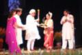 Amrita Das receiving award