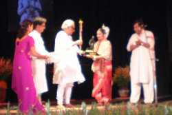 Amrita Das receiving award
