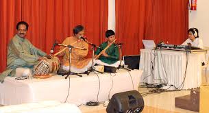 Anand Kashikar performing with his son