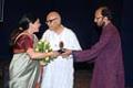 Rajendra Talak felicitated by Reema Lagoo