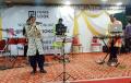 Yogesh and Kavya Pala performing in program