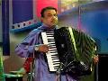 Vilas Adkar playing the accordion