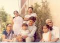 At age 8 - With family