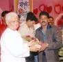 Hasyasamrat fame Sandeep Kambli being felicitated by veteran music director Pyarelalji